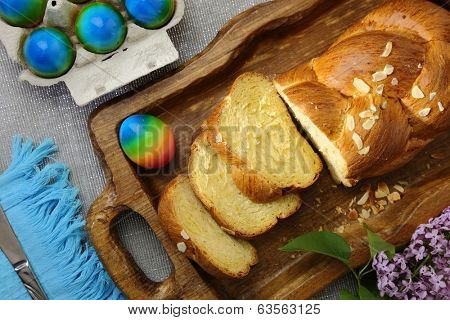 Easter sweet brioche and colored eggs