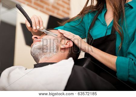 Young Man Getting A Shave