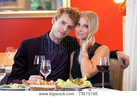 Sweet Young Couple Having Date At Restaurant