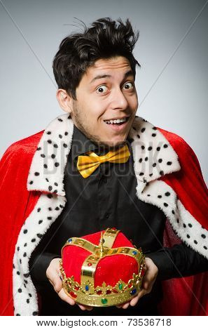 Concept with funny man wearing crown