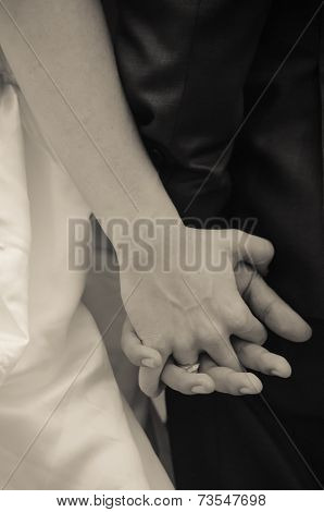 Sweet couple holding hands