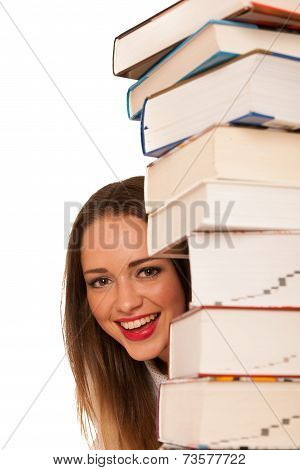 Happy Asian Caucasian Girl Lerning In Study Woth Lots Of Books On The Table