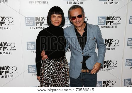NEW YORK-OCT 8: Juliette Binoche (L) & director Olivier Assayas attend the 