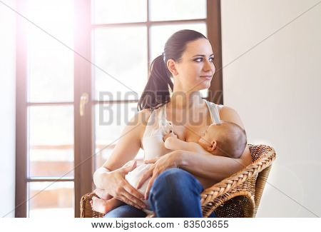 Mother breastfeeding her baby