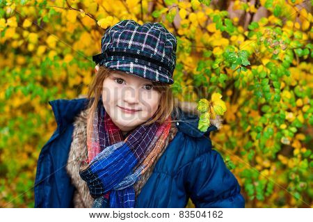 Autumn portrait of a little girl