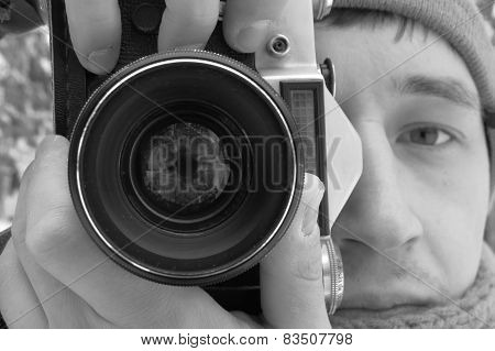 photographer using vintage camera