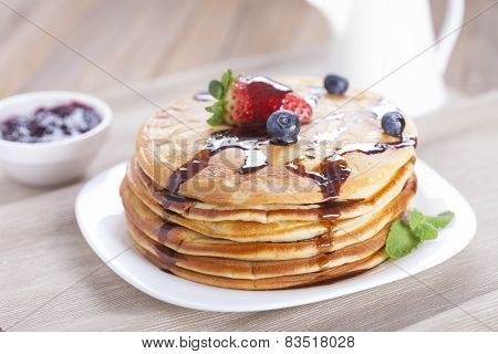 Delicious Sweet American Pancakes On A Plate With Fresh Fruits