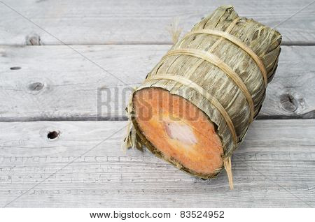 Vietnamese Conical Sticky Rice Cake Stuffed With Pork Belly On Wooden Background