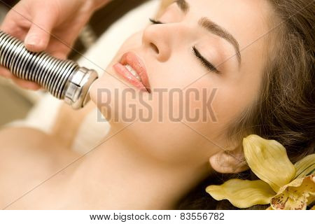 Spa Series: Young Beautiful Woman Having Facial Treatment