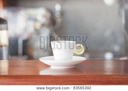 Mini White Coffee Cup In Coffee Shop