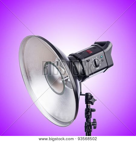 Studio light stand against the gradient