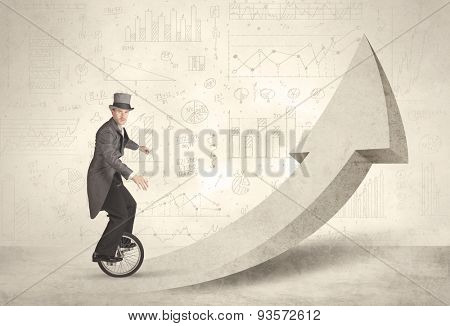 Happy business man riding a monocycle up on an arrow concept
