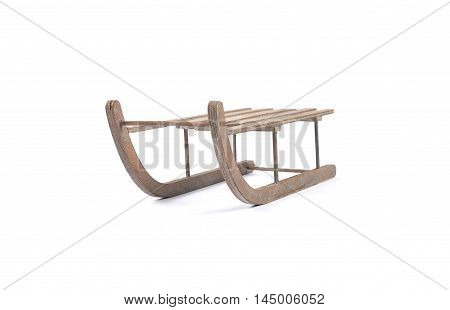 Colorful and crisp image of wodden sleigh on white background