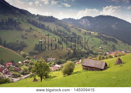 Summer landscape above the village in Moeciu de Sus - Bran, Romania