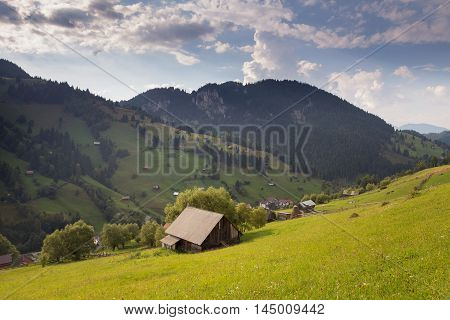Summer landscape above the village in Moeciu de Sus - Bran, Romania