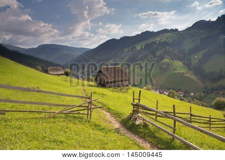 Summer landscape above the village in Moeciu de Sus - Bran, Romania