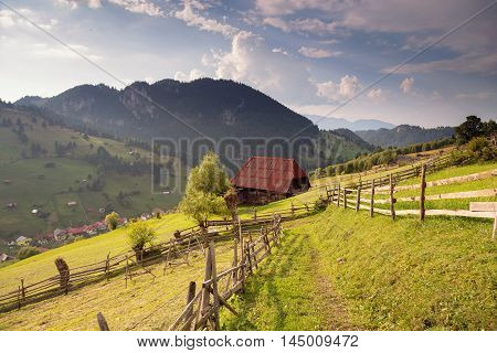 Summer landscape above the village in Moeciu de Sus - Bran, Romania