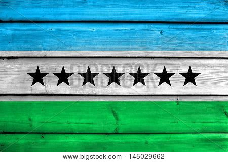 Flag Of Nueva Loja, Ecuador, Painted On Old Wood Plank Background