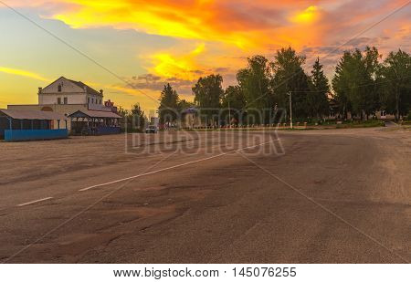BOROMLYA SUMSKAYA OBLAST UKRAINE - AUGUST 04, 2016: Central street of Boromlya village with roadside market and occasional dealers at August 04, 2016