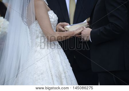 Happy Stylish Newlyweds In The Ortodox Church At Wedding