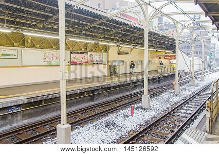 Tokyo Japan - February 8 2014:snow falling at train station in Tokyo Japan