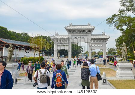 HONG KONGHONG KONG - December 8 2013:Entrance Gate to the Po Lin Monastery.The Po Lin Monastery in Lantau Island is a Buddhist temple and complex which despite being a popular attraction to tourists
