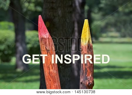 Red and yellow crayons and text Get Inspired over them