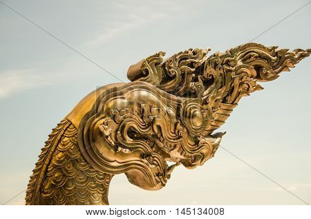 Spinning Naga Asia Golden Sky historical heritage in a white ground zoom fear .