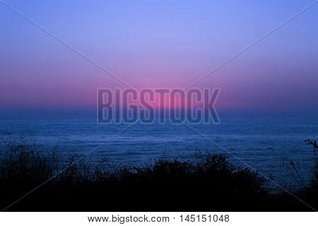 Magnificent scenery after sunset at the sea