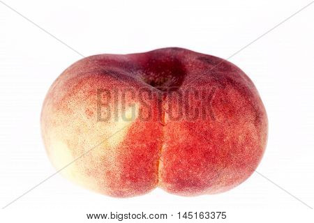 Fruit of Saturn Peach ( Paraguayos ) isolated on white background .
