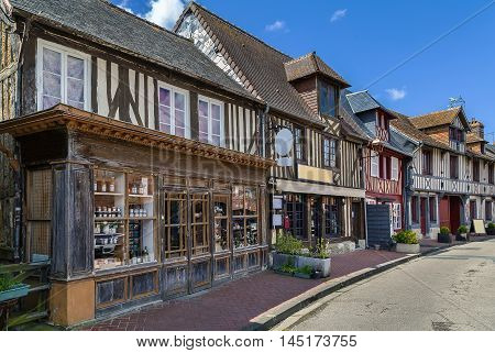 street with historical half-timbered houses in Beuvron-en-Auge France