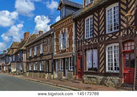 street with historical half-timbered houses in Beuvron-en-Auge France