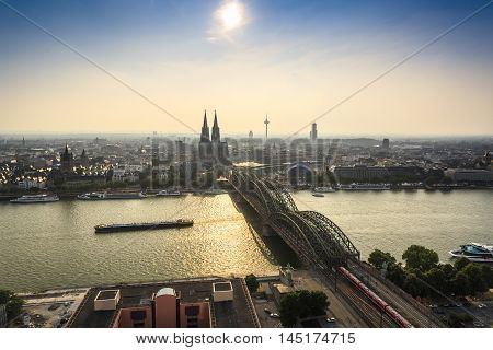 Koln Cityscape With Cathedral And Steel Bridge, Germany