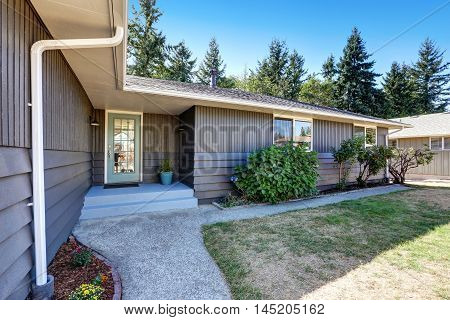 American Grey Rambler House Exterior With Entrance Porch