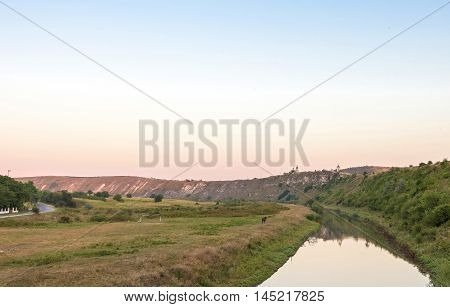 Raut river at Orheiul vechi memorial complex at sunset in Moldova
