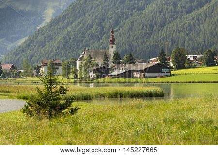 Lake Pillersee With Parisch Church In Sankt Ulrich Am Pillersee