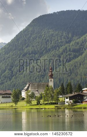 Lake Pillersee With Parisch Church In Sankt Ulrich Am Pillersee