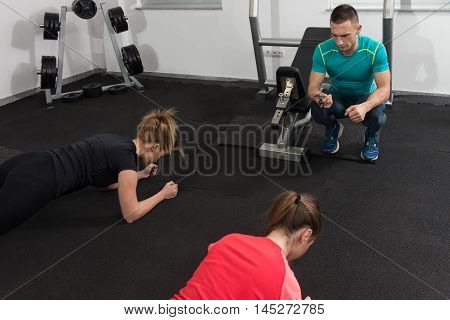 Gym People Stretching And Looking Very Happy