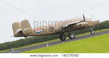 Leeuwarden, The Netherlands - June 10: Ww2 B-25 Mitchell Bomber In Dutch Markings Take Off During Th