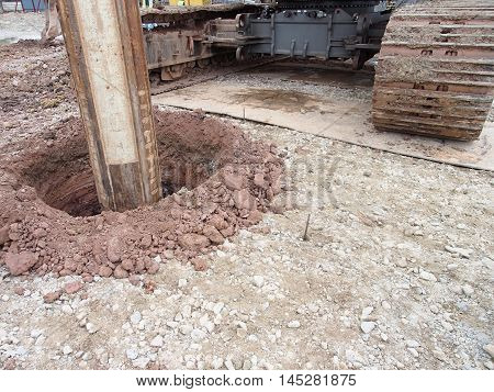 MALACCA, MALAYSIA -MARCH 12, 2015: Bore pile rig machine at the construction site in Malacca, Malaysia. The machine used to driven pile for building foundation work.