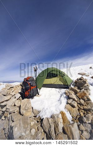 Camping on the top of the mountain in winter.