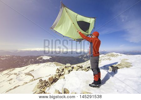 Camping on the top of the mountain in winter.