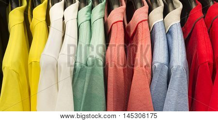 retail - clothes rail with colorful shirts