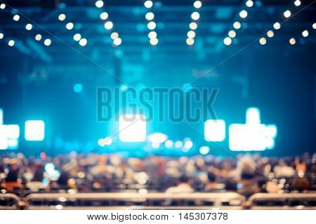Blurred Background : Bokeh Lighting In Concert With Audience ,music Showbiz Concept
