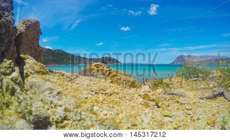 rocks by the sea in Capo Coda Cavallo Sardinia