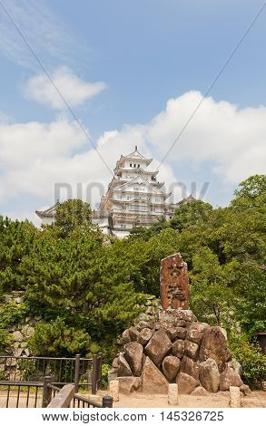HIMEJI JAPAN - JULY 21 2016: Main keep (tenshukaku) of Himeji castle (White Egret Castle circa 1609) after repairing works ended 2015. National Treasure of Japan and UNESCO World Heritage Site