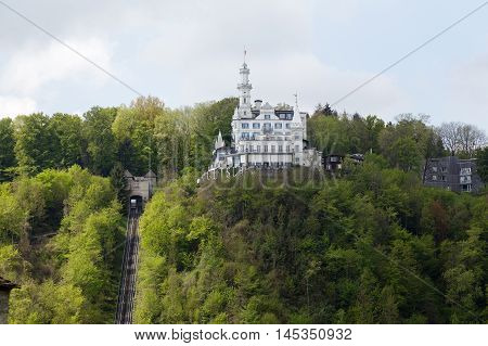 LUCERNE SWITZERLAND - MAY 04 2016: Gutsch castle with its hotel and restaurant is located on a hill over the city. Its unique architecture and its location makes it one of the tourist attractions