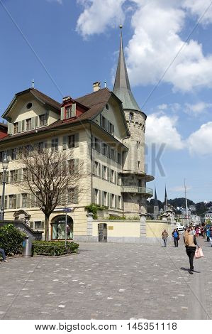 LUCERNE SWITZERLAND - MAY 04 2016: Haus zur Gilgen one of the oldest stone houses in the city and is located on the right bank of the river Reuss.