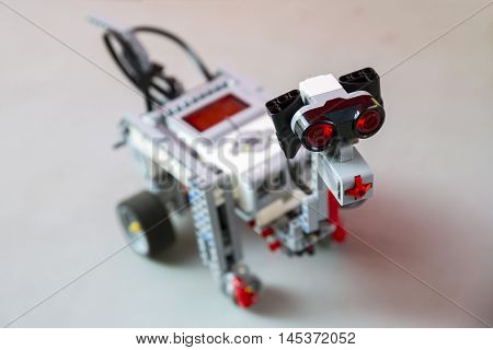 Sofia, Bulgaria - August 28, 2016: Toy robot made from toy plastic colorful blocks. Dog toy.