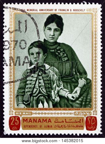 MANAMA - CIRCA 1970: a stamp printed in Manama shows the Young Franklin Delano Roosevelt with his Mother circa 1970